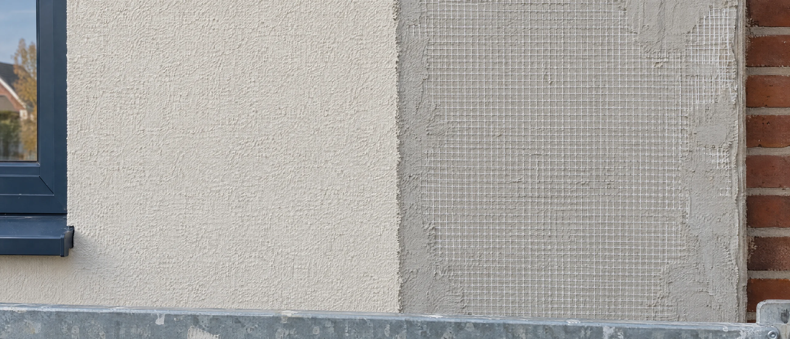 Fassade mit Kratzputz und Armierungsgewebe