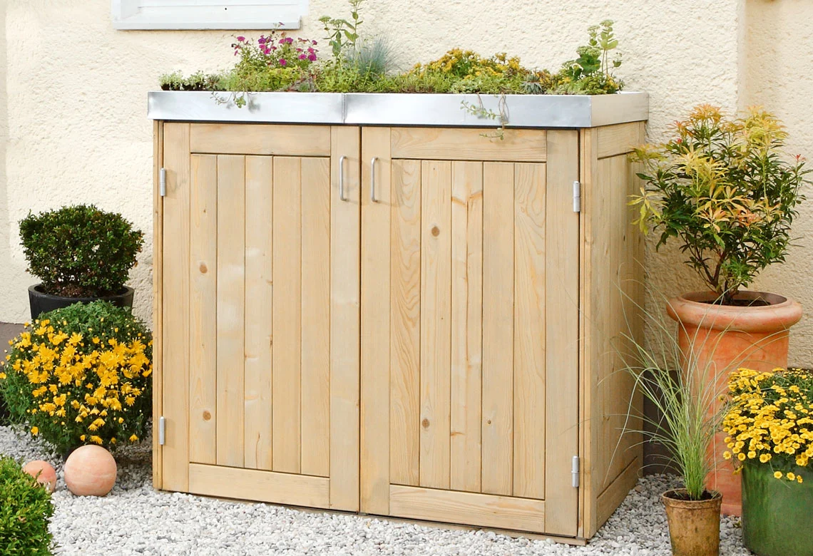 Mülltonnenbox aus Holz mit Pflanzdach